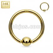 14Kt. Gold Fixed Ball Hoop Ring. Never Loose a Ball.